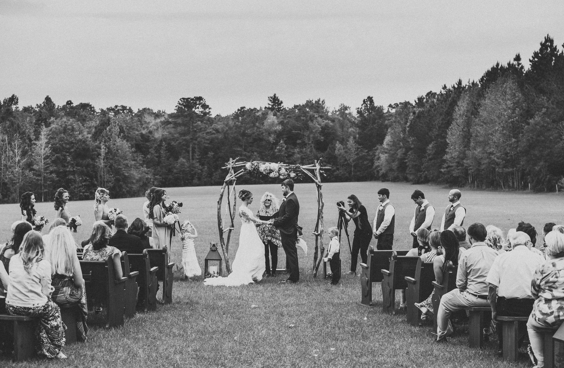 black and white portrait of outdoor wedding ceremony at live oak plantation