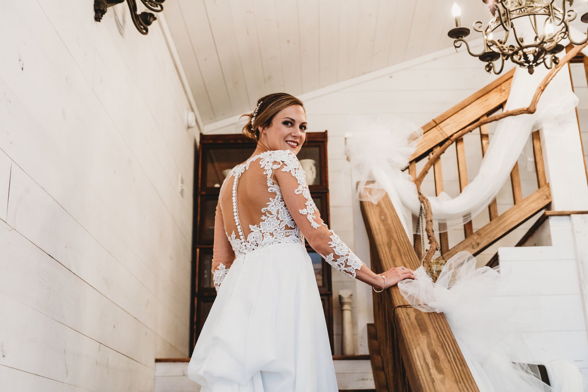 bride walking up venue stairs