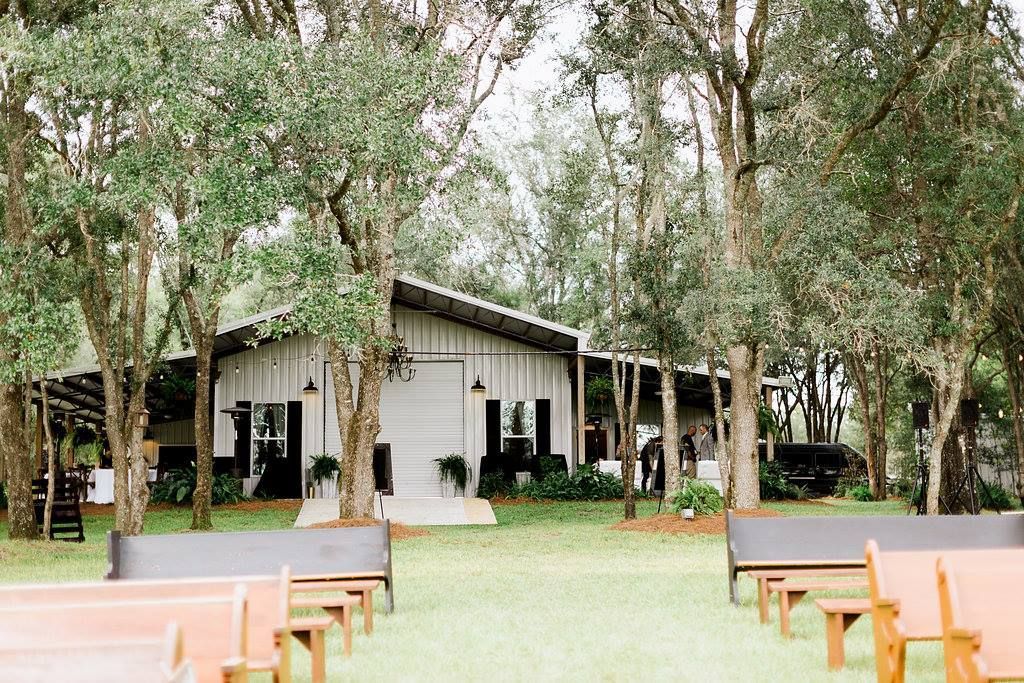 outdoor wedding ceremony with church pews