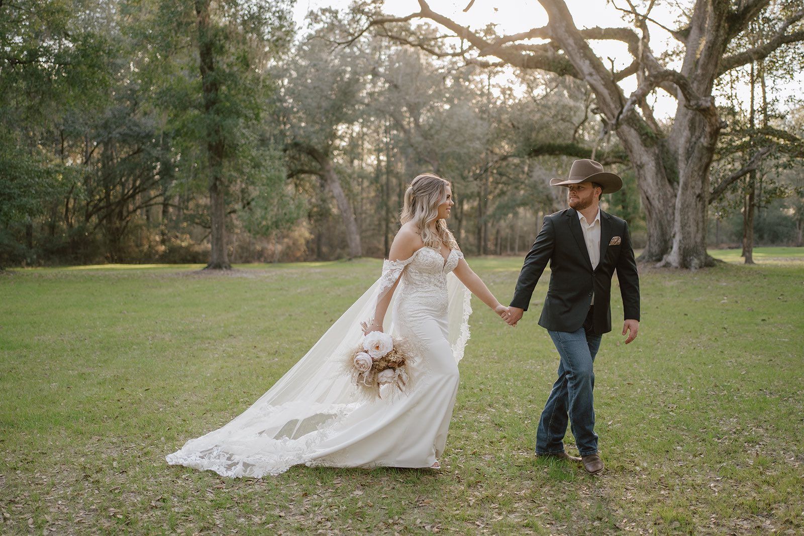 bride and groom holding hands