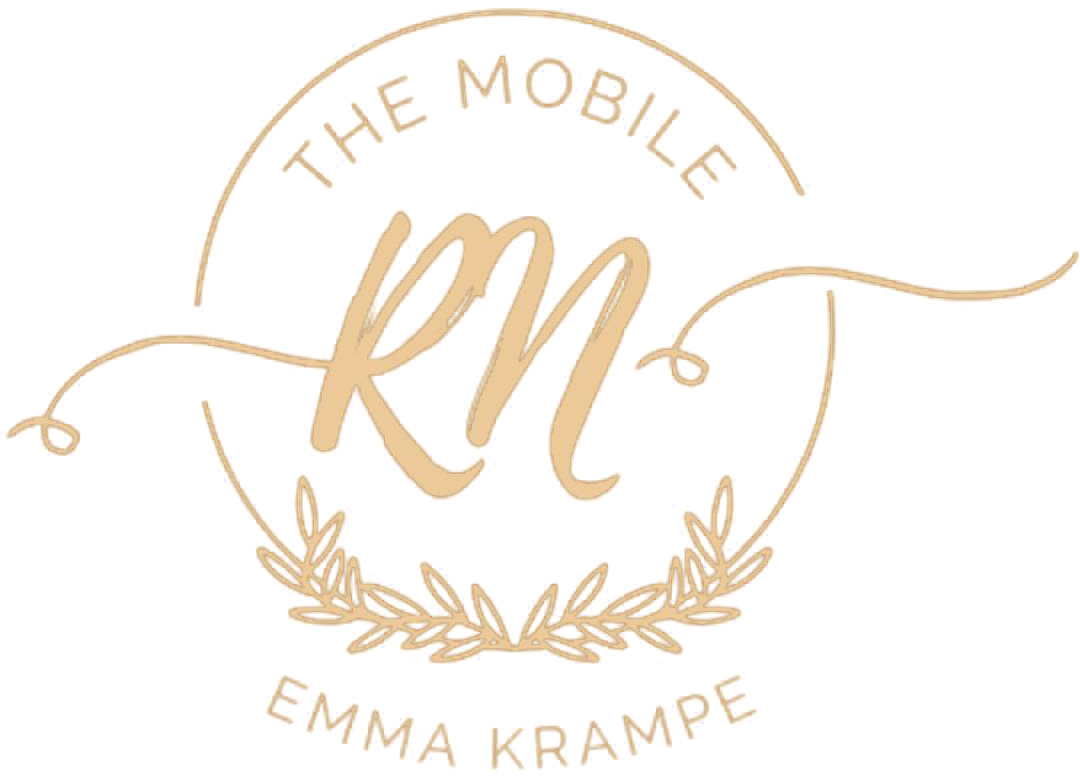 Gold logo for "The Mobile RN Emma Krampe." Features stylized initials "RN" within a circle, adorned with leaves.