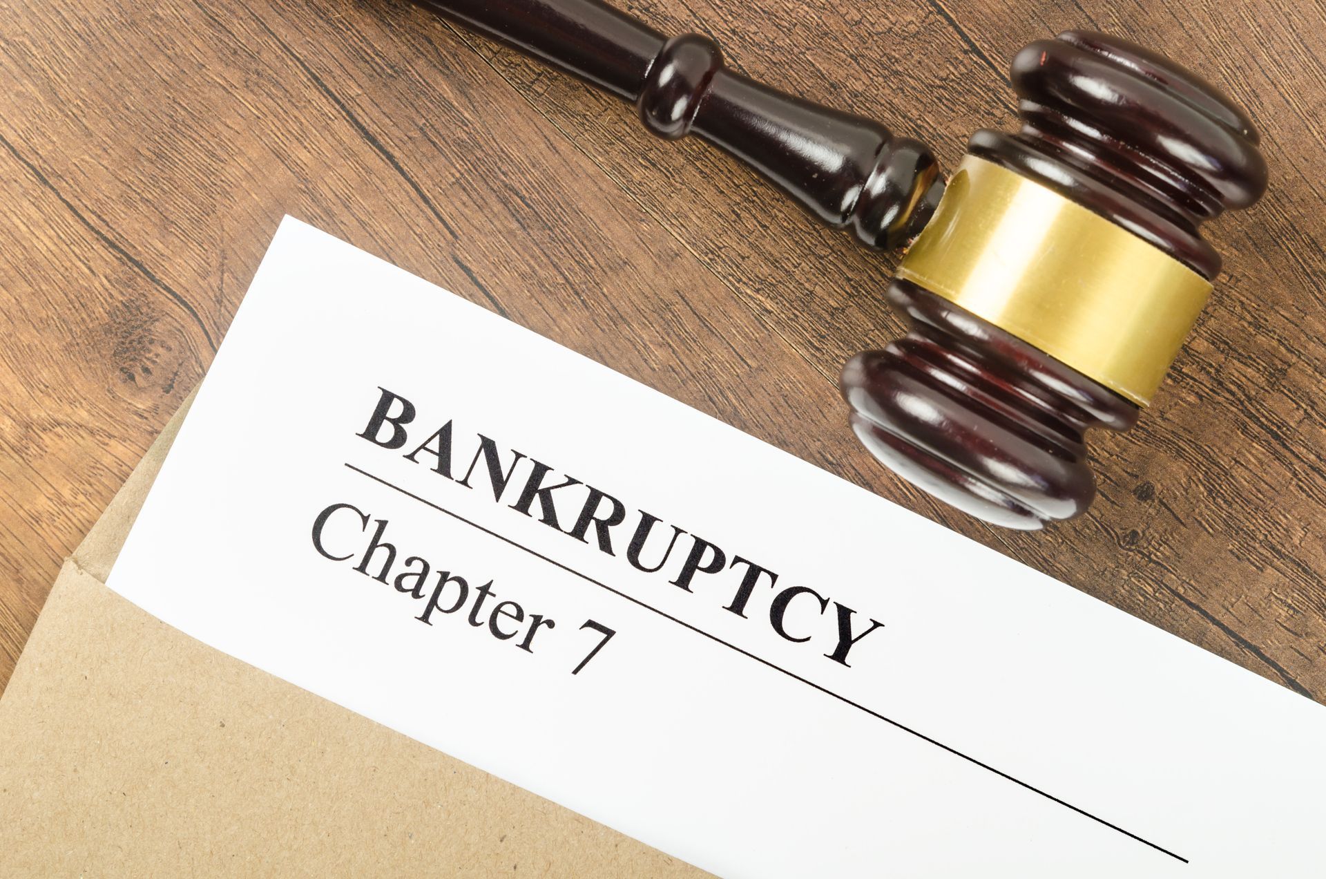 Gavel on bankruptcy documents labeled 