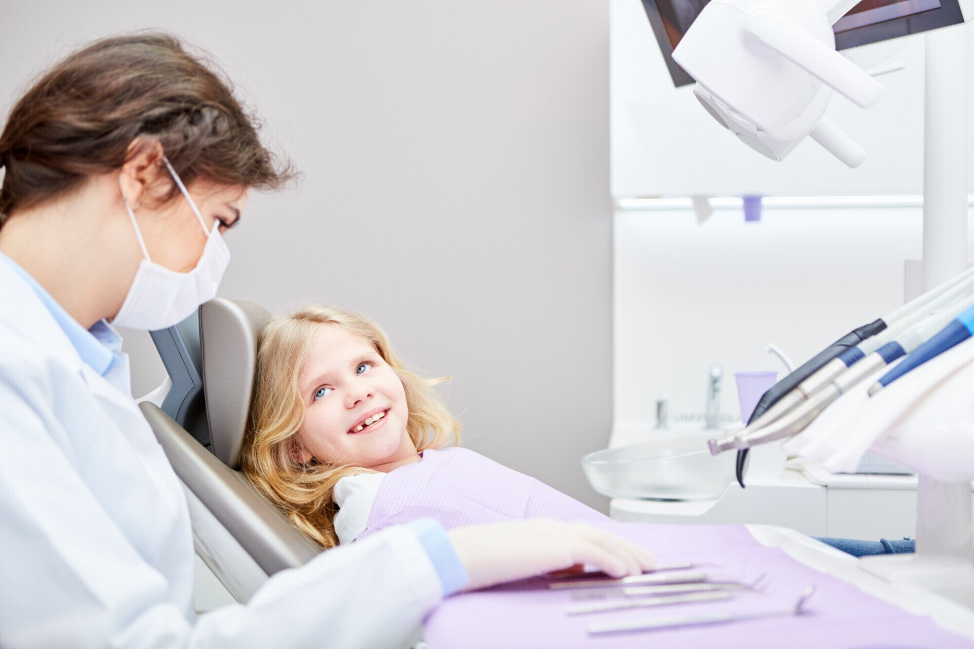 Dentist with Younger Patient
