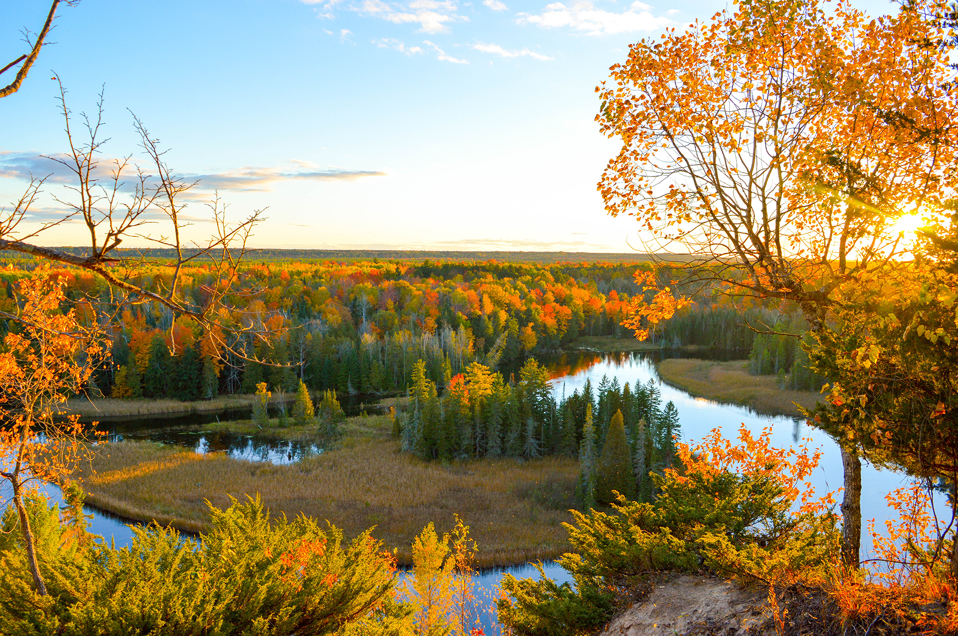 A woman is holding a cell phone in her hands.