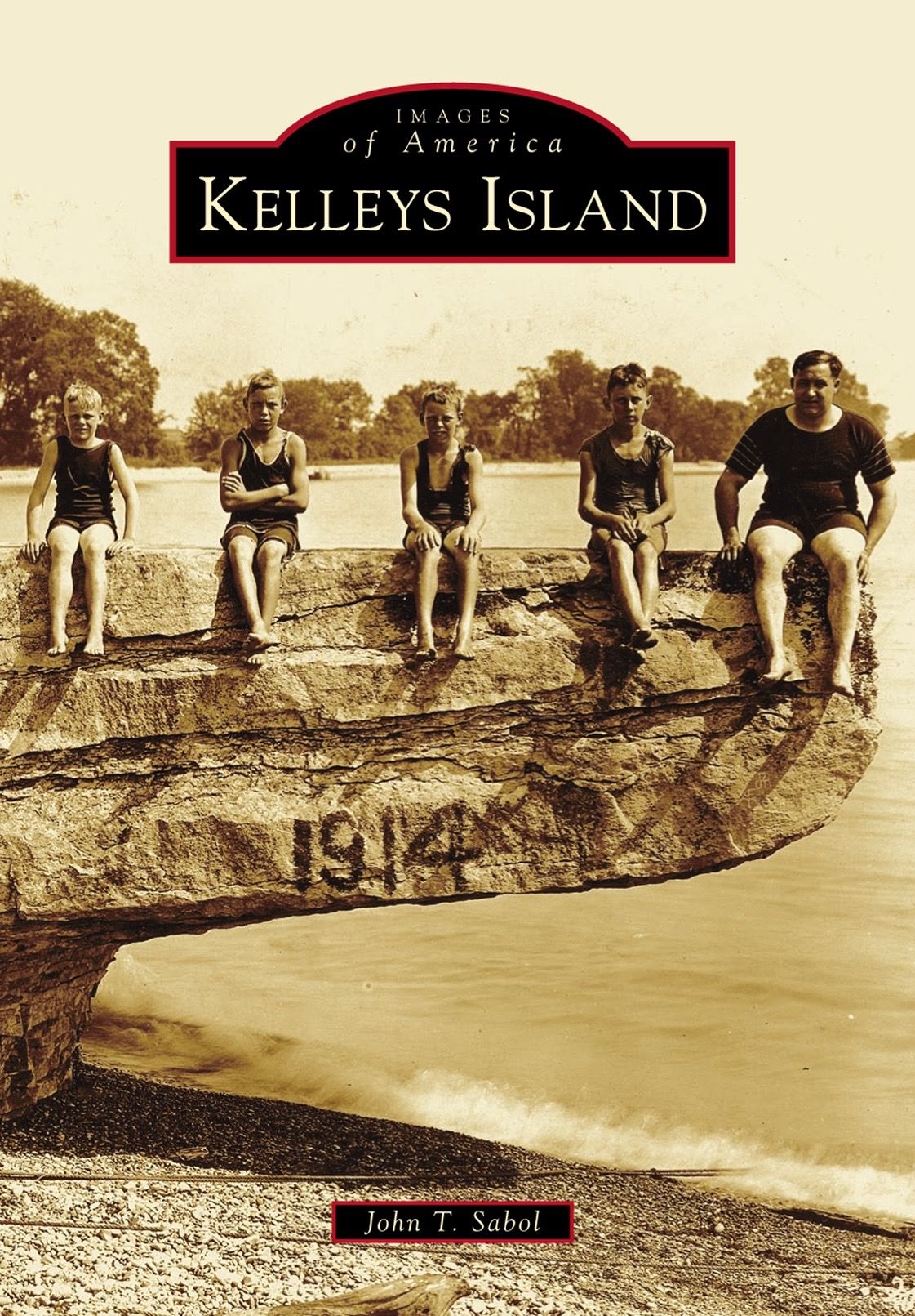 A book cover for kelley's island shows a group of people sitting on a rock
