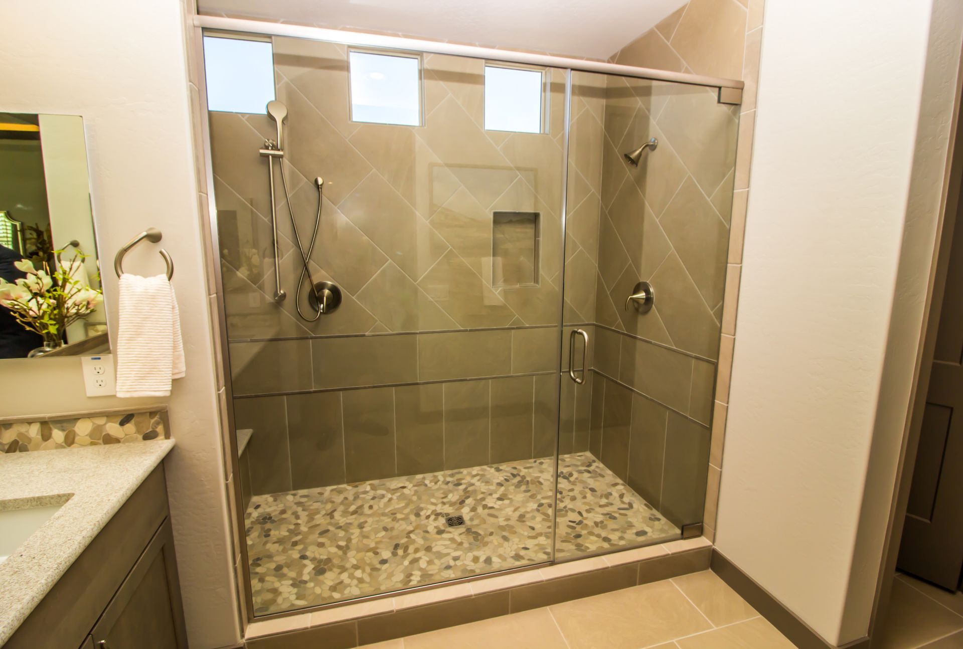 Bathroom glass shower with a door