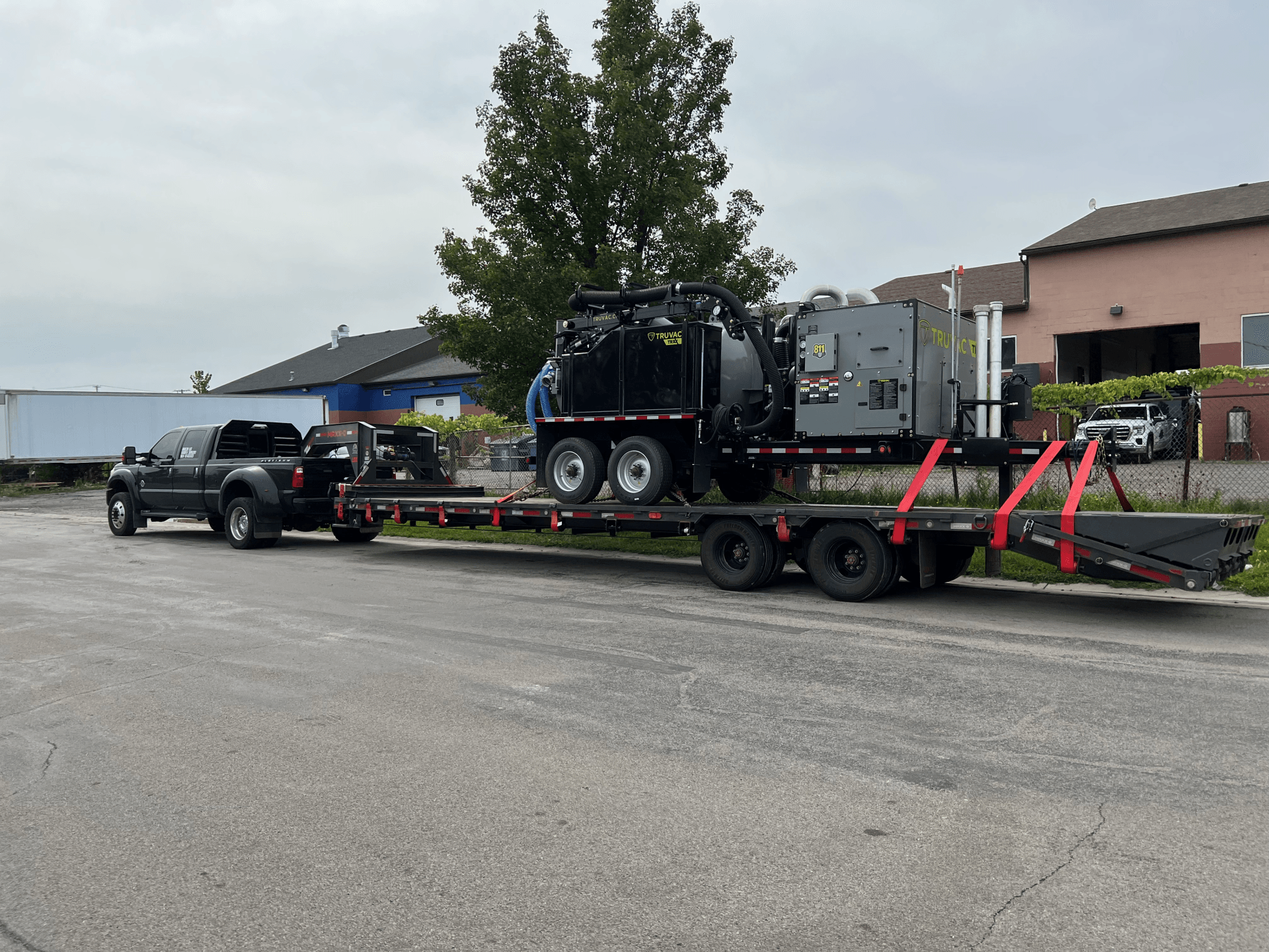 tanks and other equipment on flatbed trailer with haul3d hotshot trucking