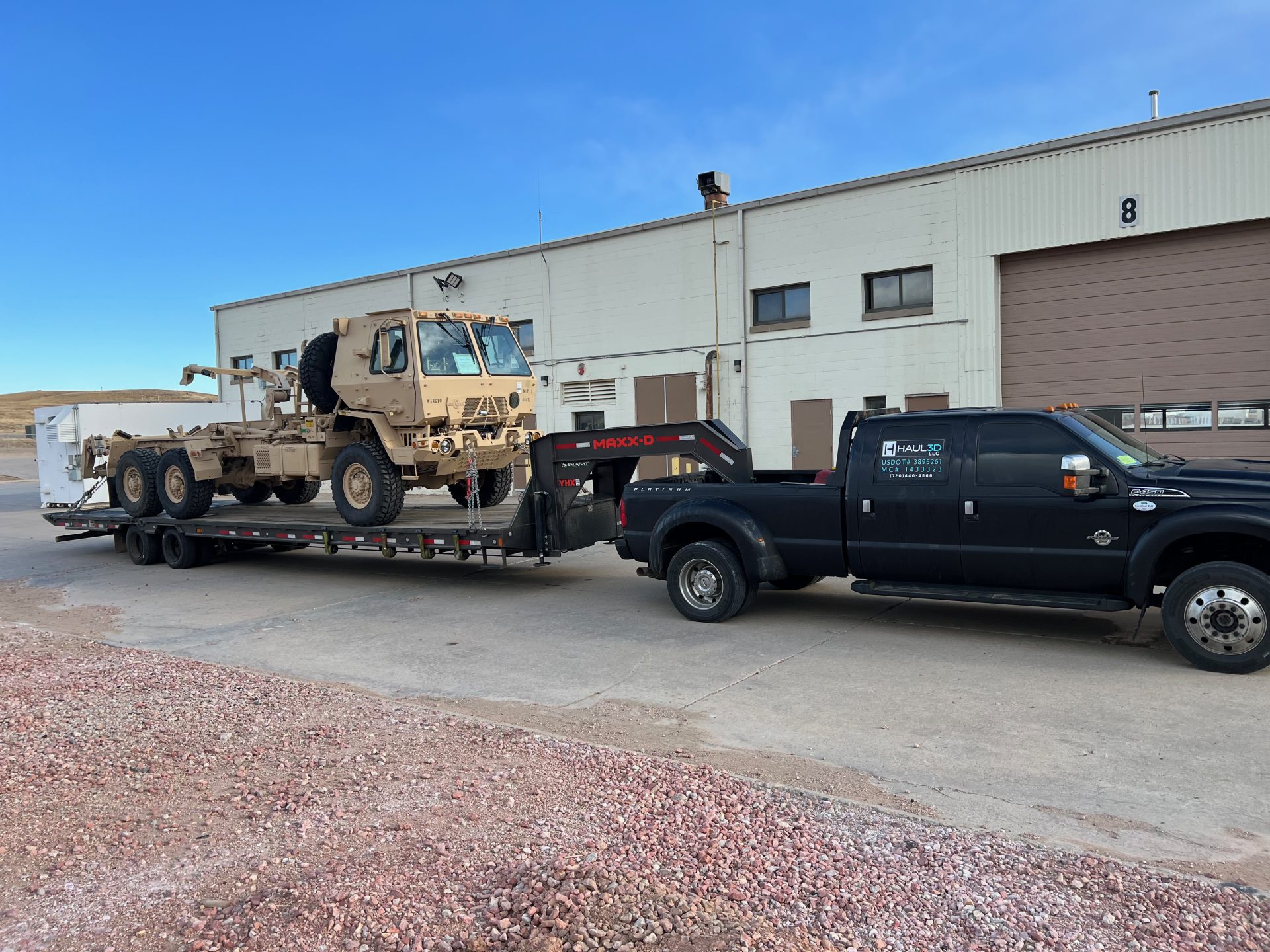 army vehicle transported by haul3d hotshot trucking