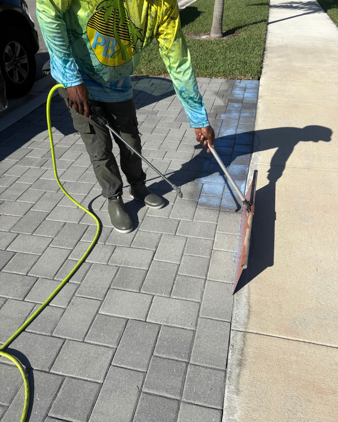 A before and after photo of a brick walkway