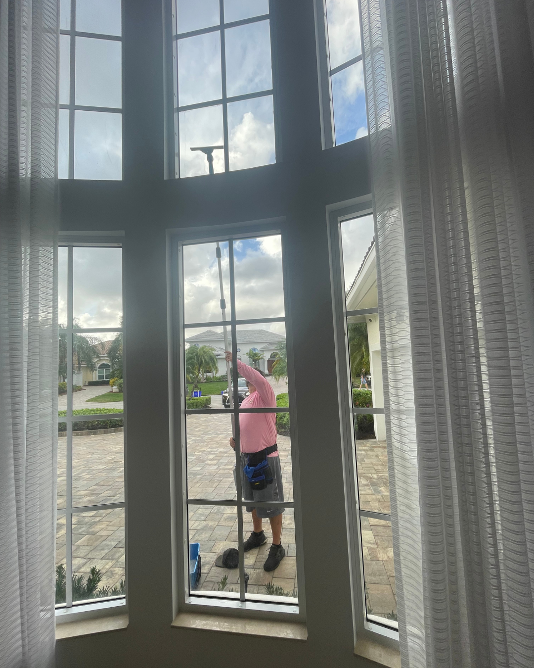 A before and after photo of a brick walkway