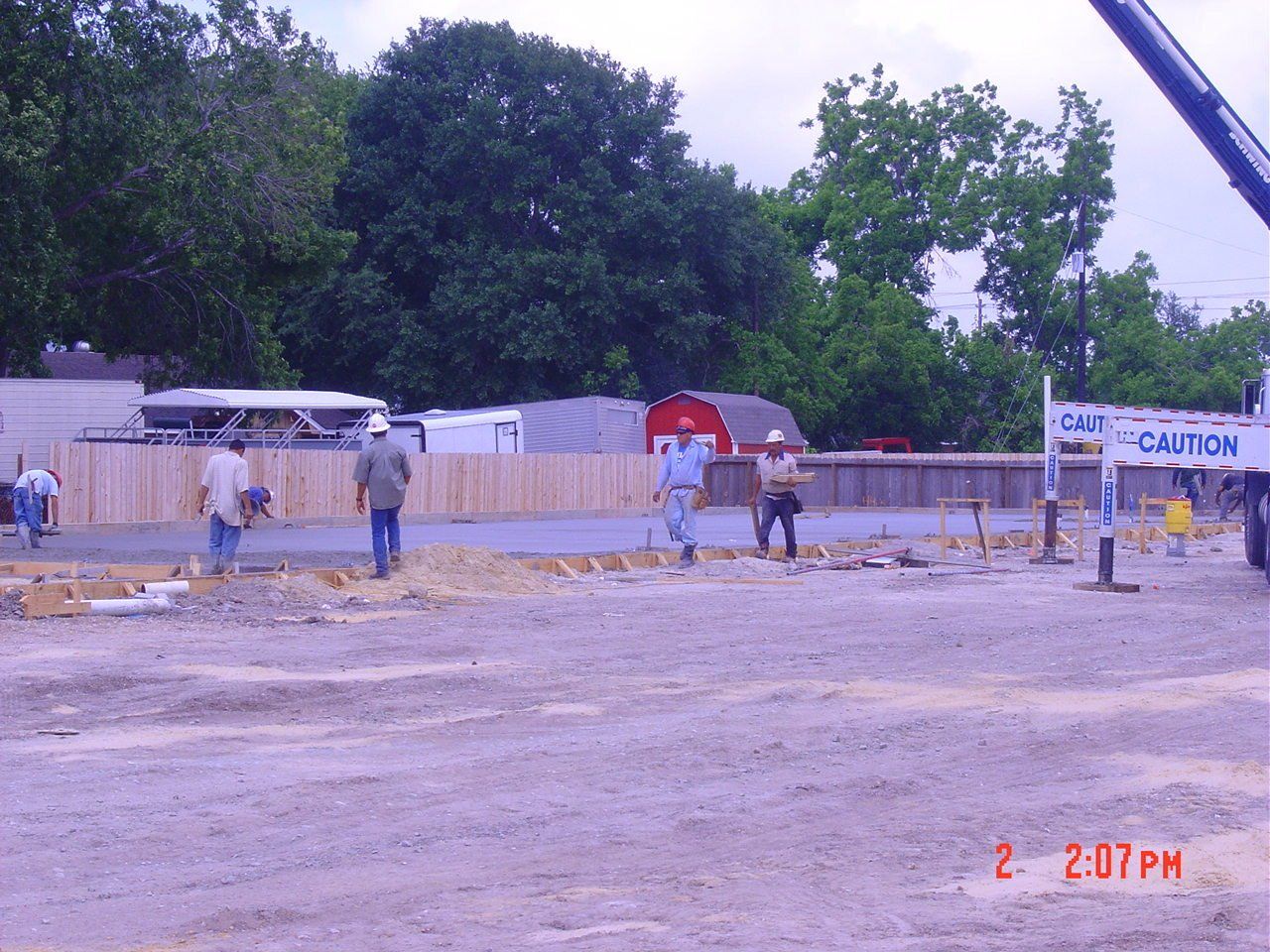 Construction team at work - Deer Park, TX - DH Construction