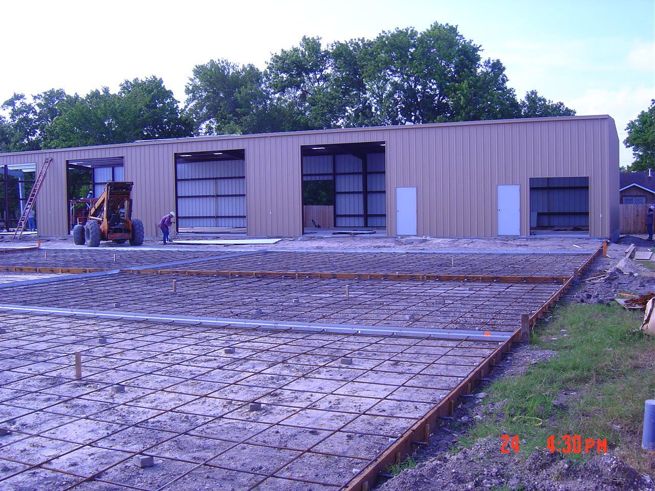 Pouring concrete into form - Deer Park, TX - DH Construction