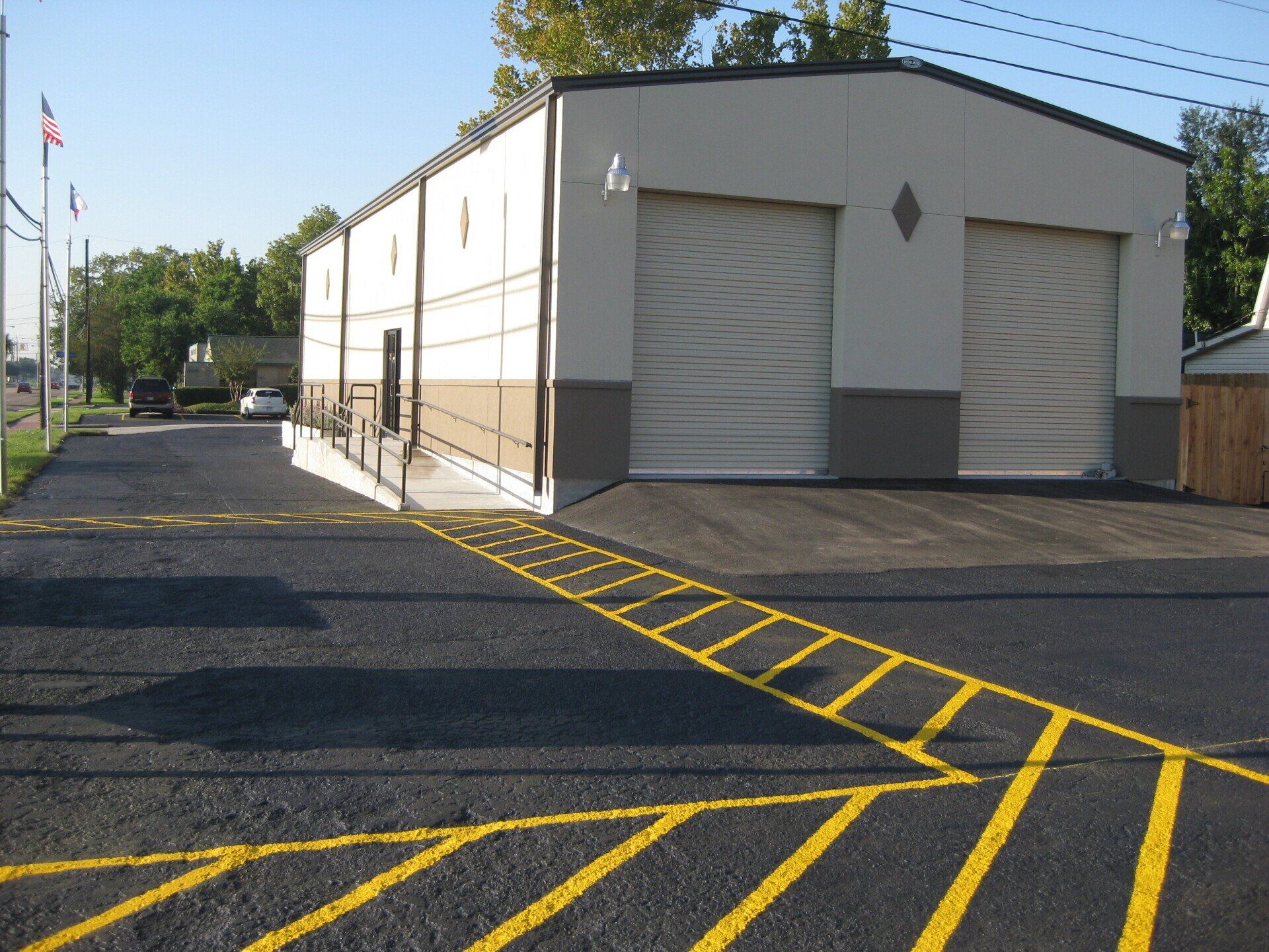 Line striping asphalt floor - Deer Park, TX - DH Construction