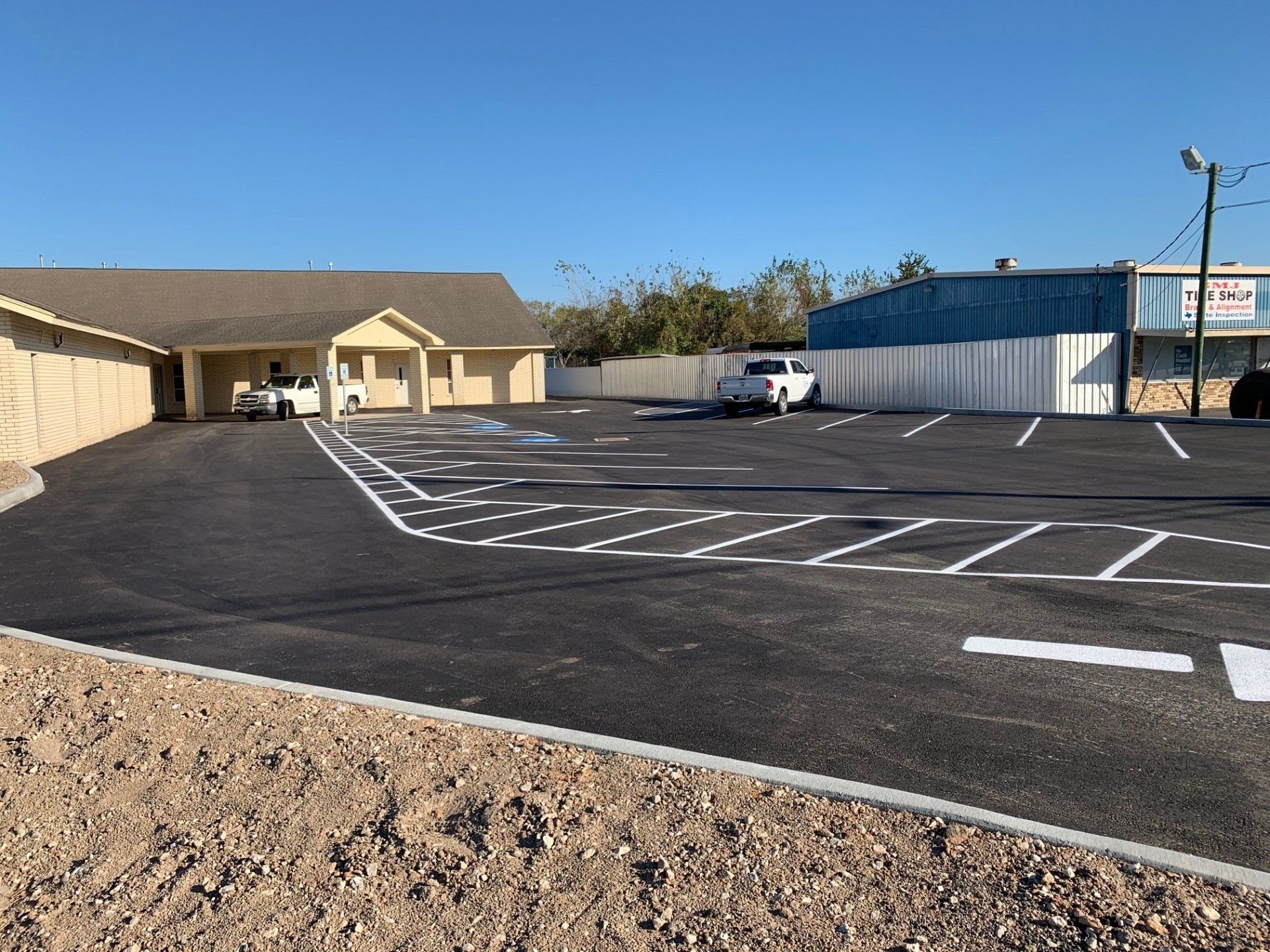 Line strips on warehouse parking lot - Deer Park, TX - DH Construction