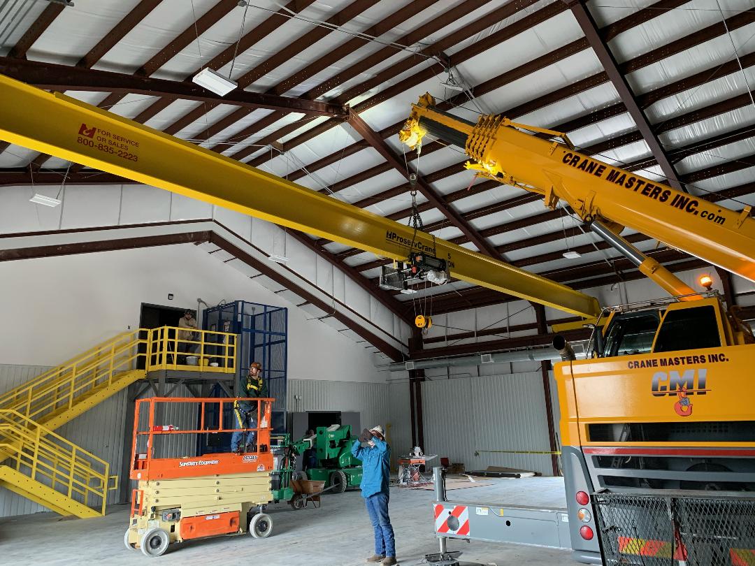 Tractors inside warehouse - Deer Park, TX - DH Construction