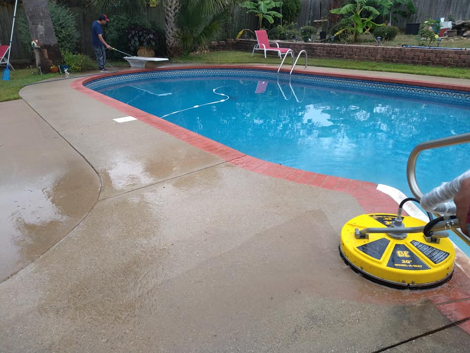 Pressure washing pool concrete