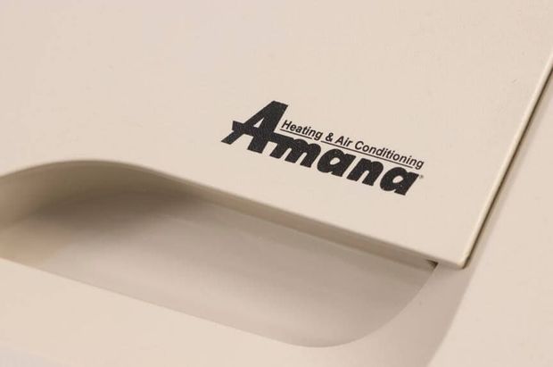 A white box with the word Amana on it that represents a logo design example.