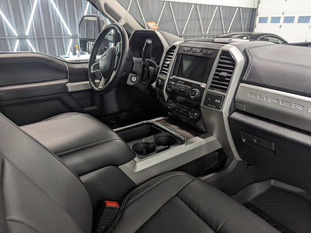 The interior of a ford super duty truck is shown.