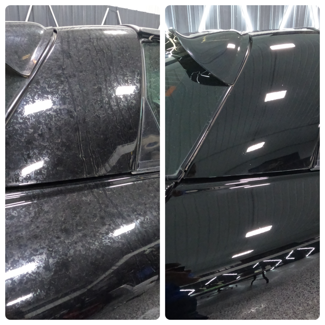 A black motorcycle has a license plate that says indian motors