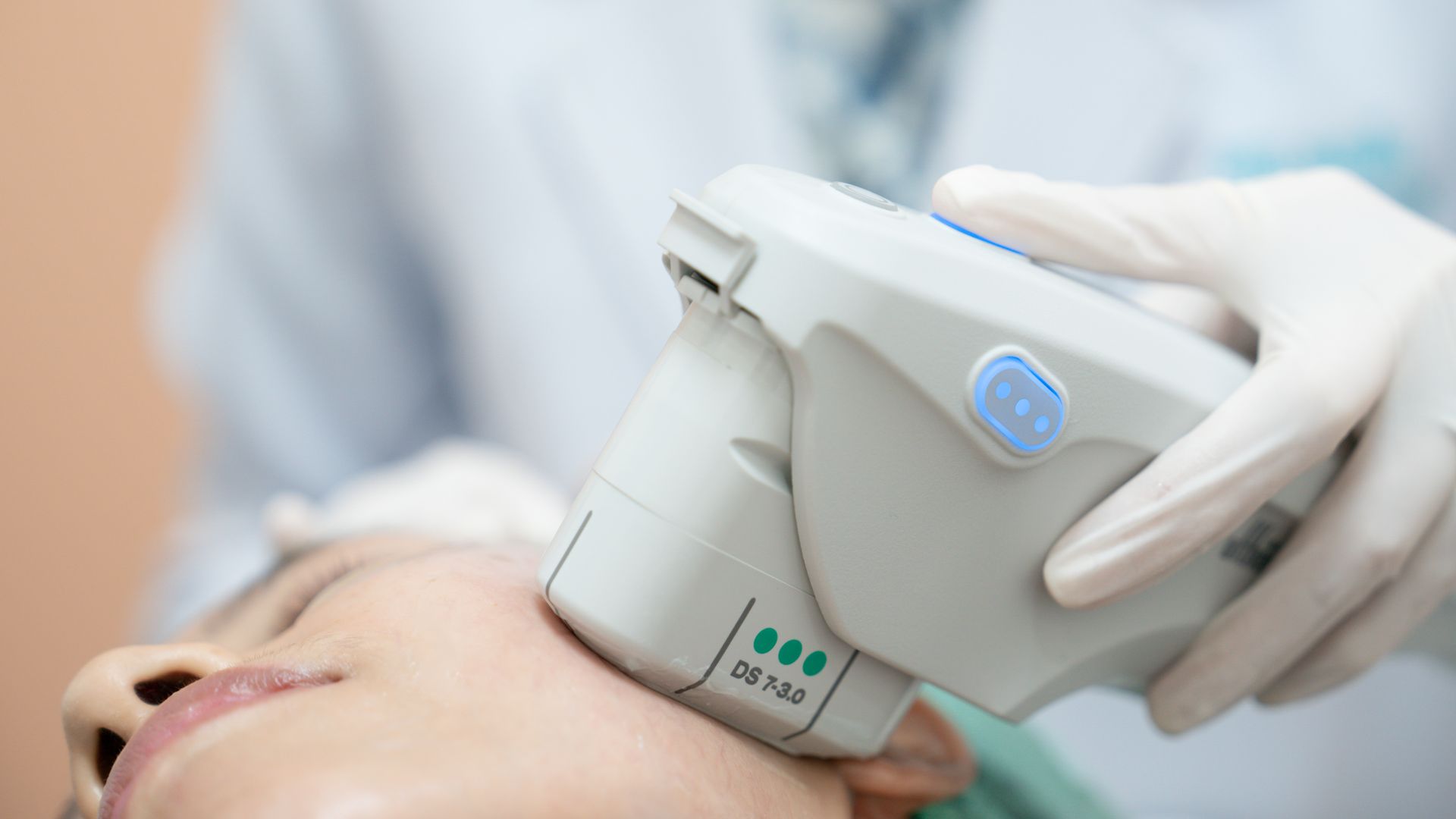 Beautician procedure by electric device, therapy treatment for skin tightening in aesthetic clinic.