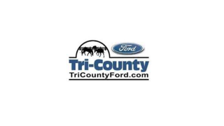 A logo for a ford dealership in tri-county