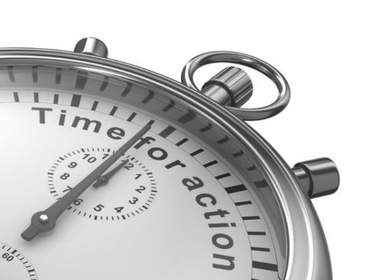 Silver stopwatch with the words 