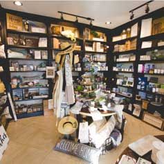 A store filled with lots of shelves filled with lots of items.