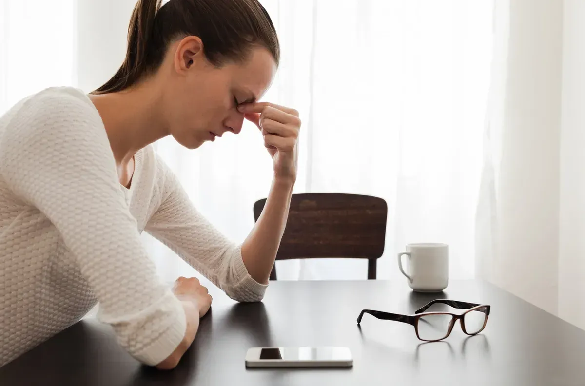 a woman with a headache.