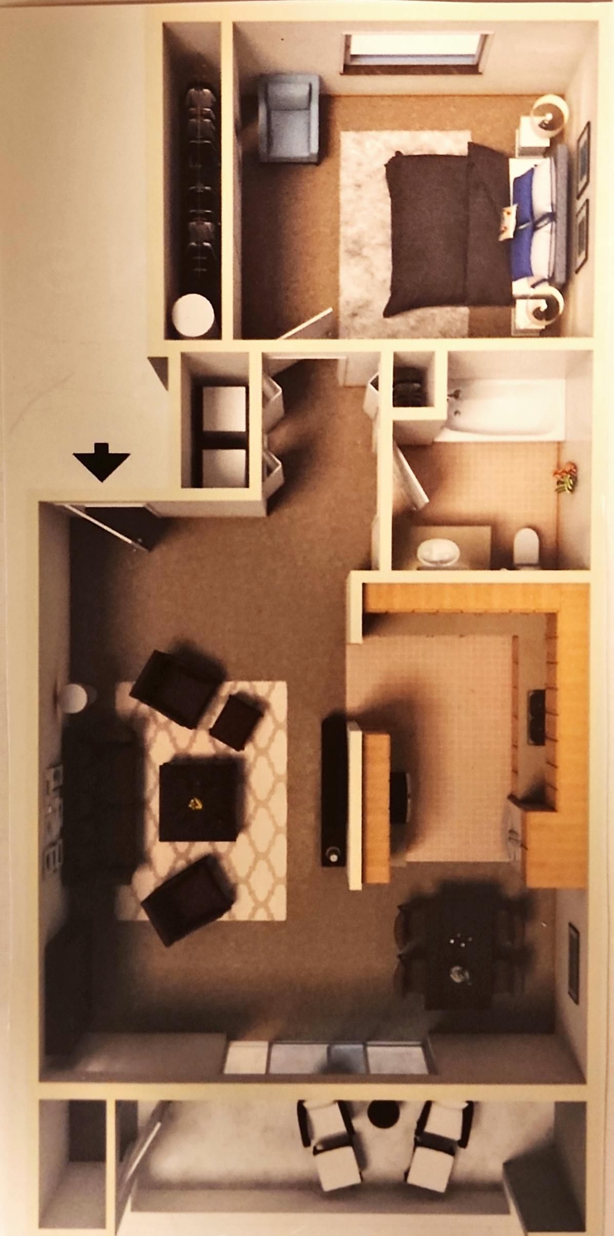A floor plan of a house with a bedroom , living room , and kitchen.