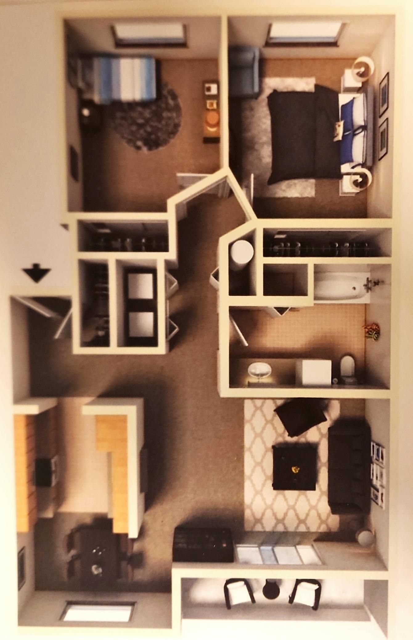 A floor plan of a house with two bedrooms and a living room.