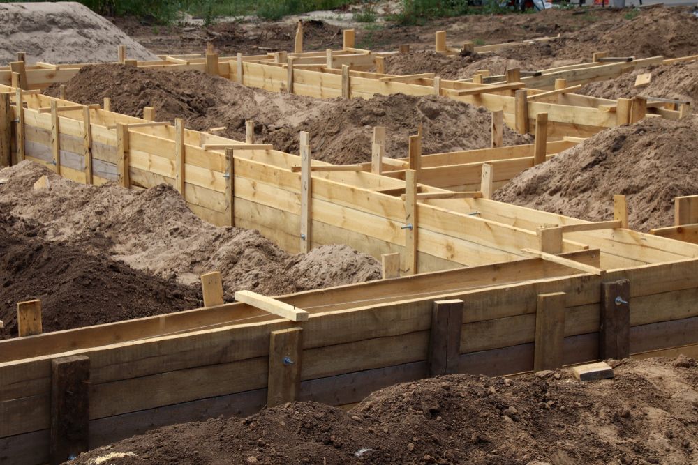 Wooden Formwork for a Concrete Foundation Set in a Dirt Construction — Environment Restoration Solutions in Armidale, NSW