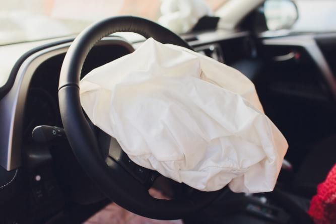 A Car with An Air Bag on The Steering Wheel — Belmont Auto Electrics in Belmont, NSW