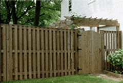 Vertical Shadowbox fence with Top Cap and Arch Top Stockade gate