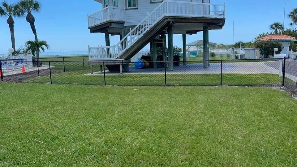 Black Chainlink fence at beach