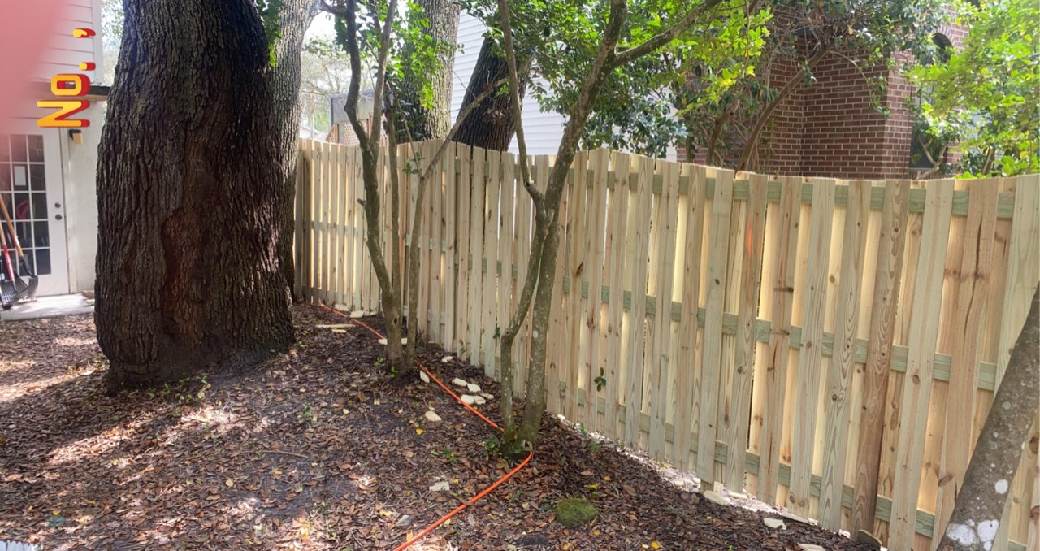 Sweep Top Vertical Shadowbox Wood fence