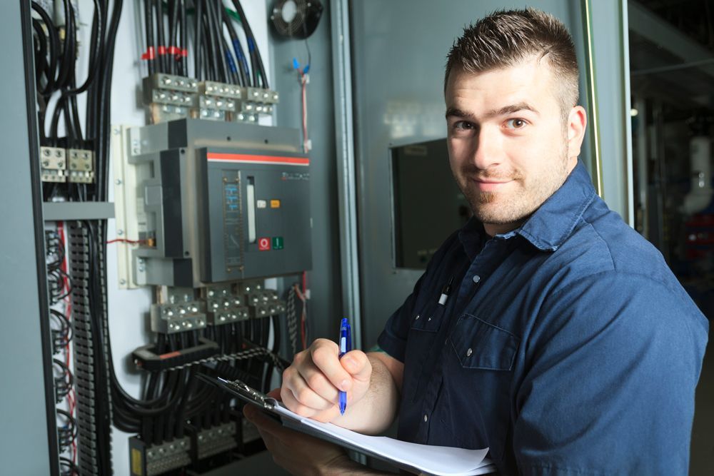 Electrician Taking Notes — Commerce Township, MI — Michigan Quality Electric
