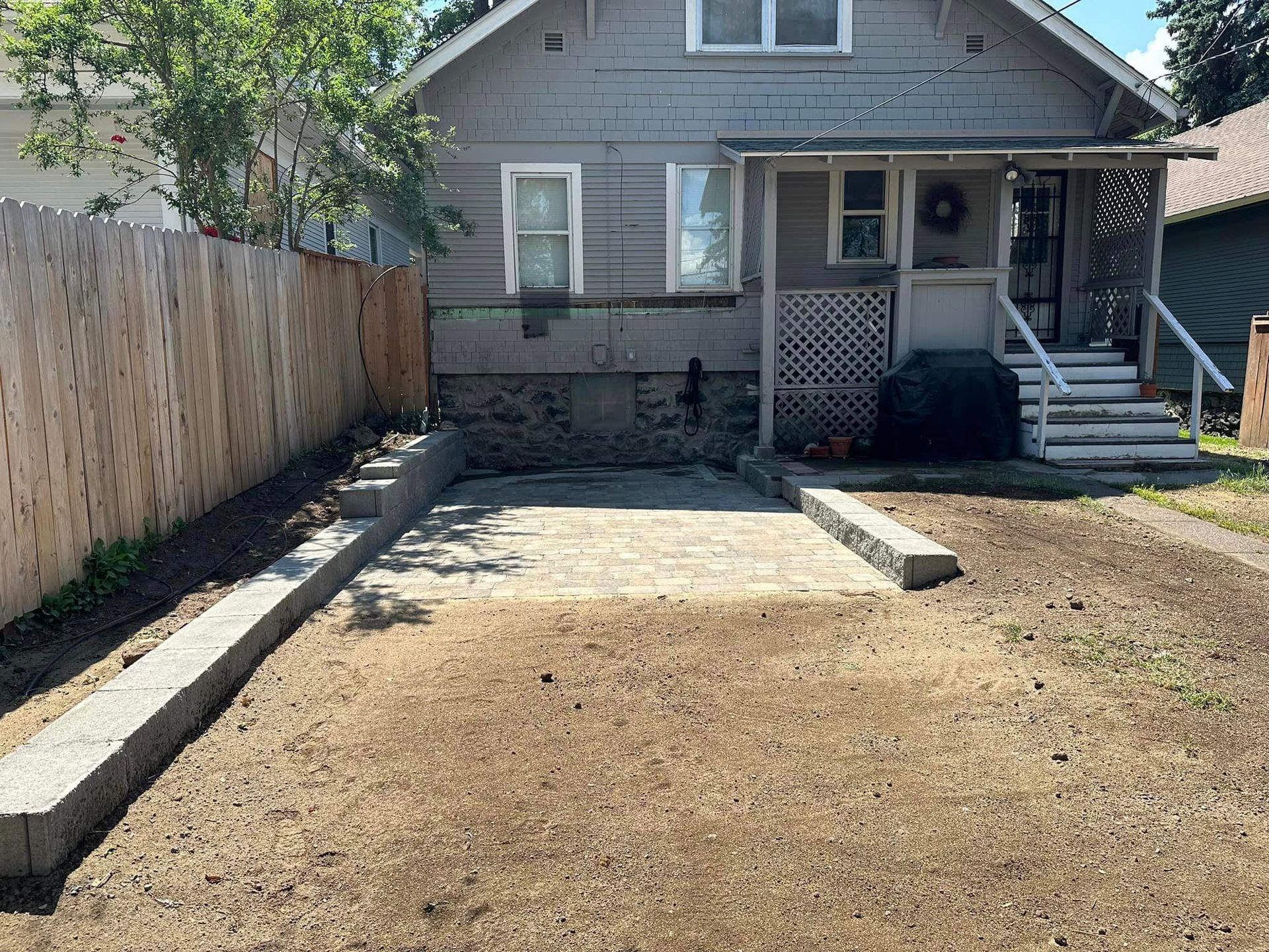 House with Concrete Driveway | Spokane, WA | Cornerstone Landscape, LLC
