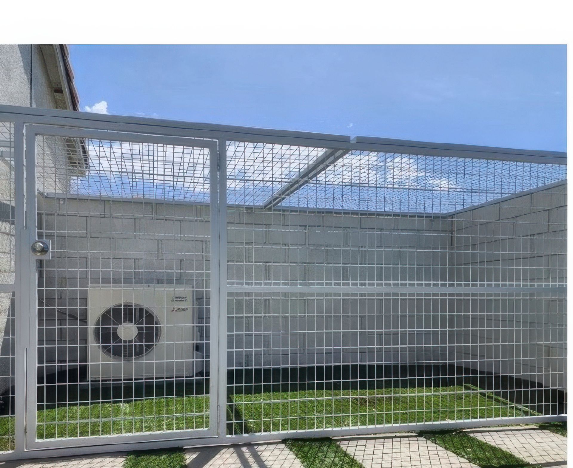 A fence with a fan inside of it