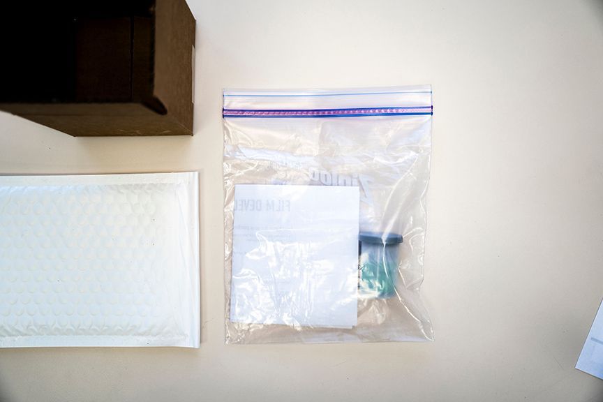 35mm and Sharp Prints film developing order form in a zip lock bag.