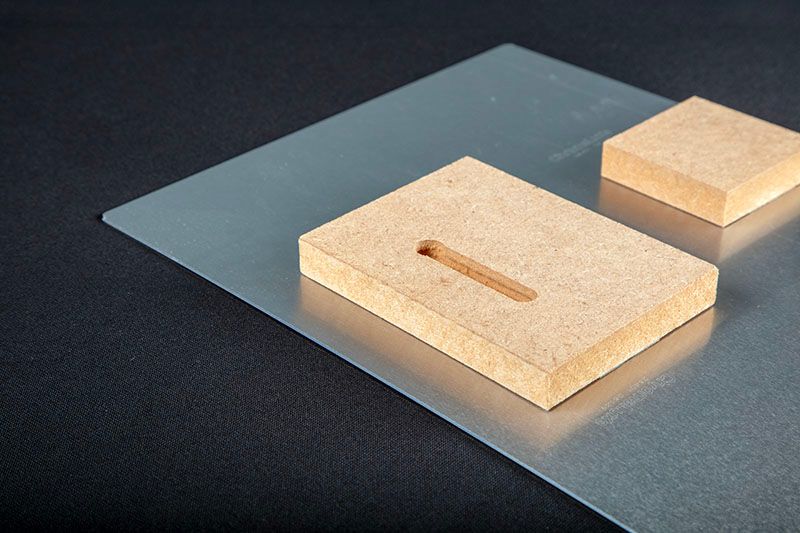 Wood mounting blocks for metal prints.