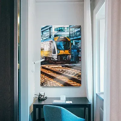 A metal photo print hanging on a wall