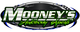 Mooney's Autobody Experts logo. Oval design with text in silver and green over a carbon fiber background.