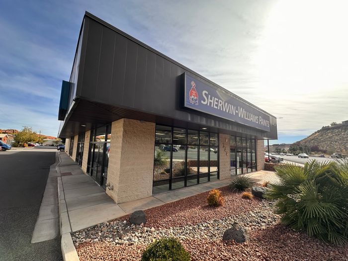 Commercial roof installation by Riverbend Roofing on Sherwin-Williams building in Utah