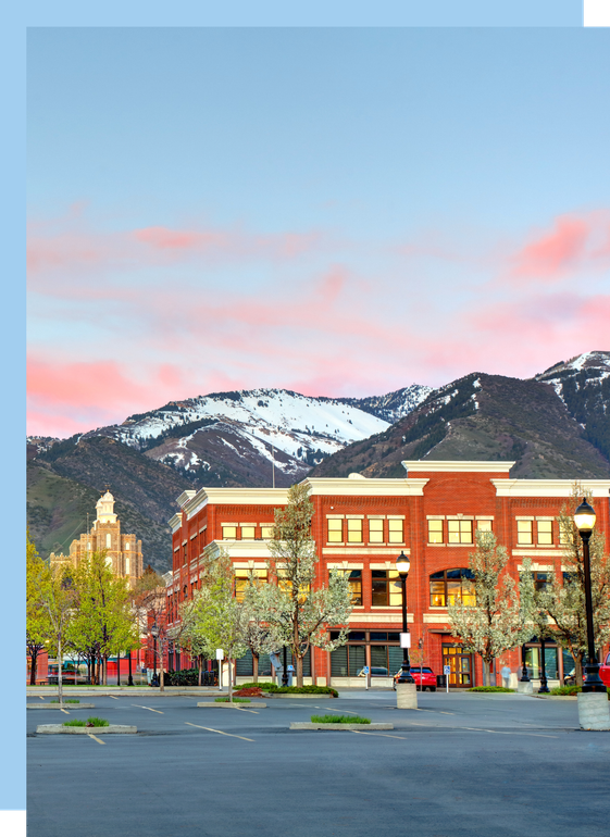 Northern Utah commercial roofing project with Logan, Utah Temple & mountain backdrop