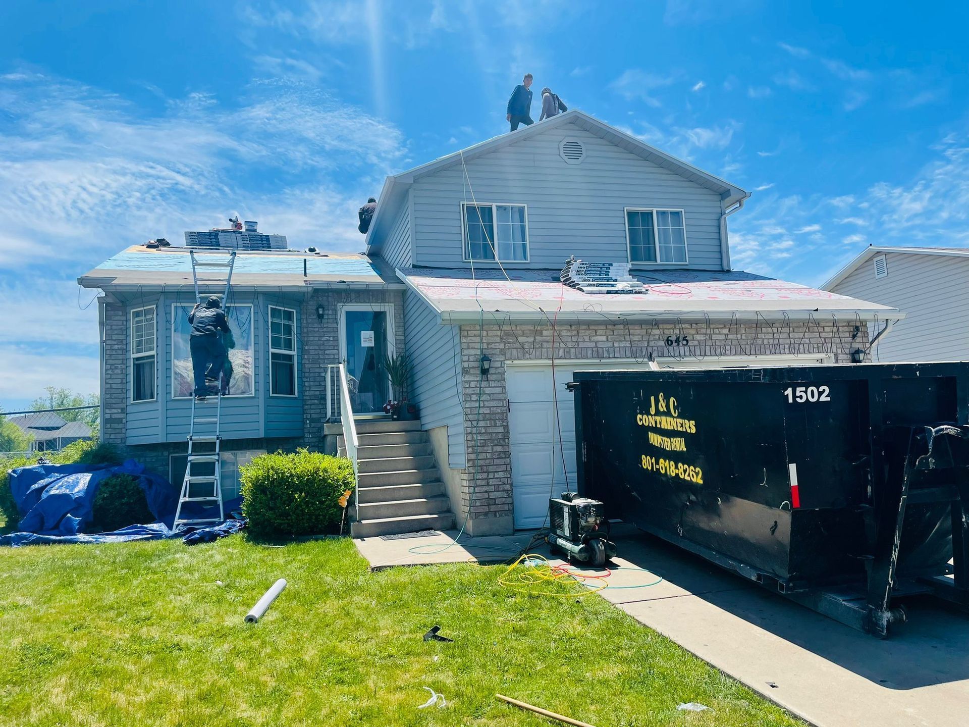 Riverbend Roofing technician performing roof repairs in Northern Utah