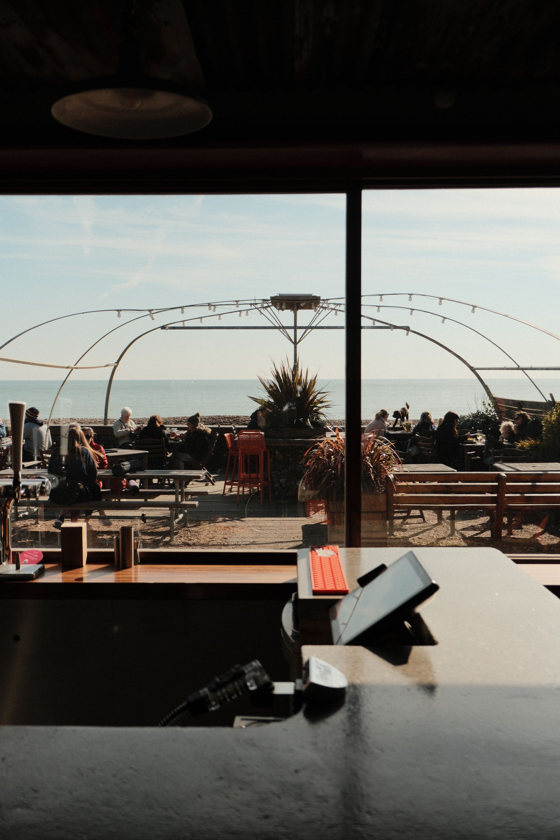A table filled with bowls of food and plates of food