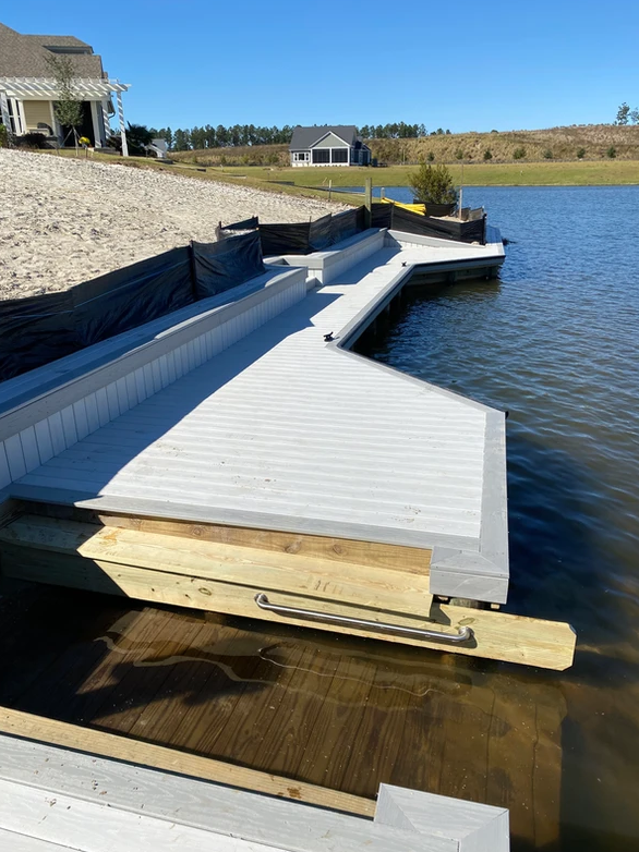 A dock is being built on the shore of a lake.