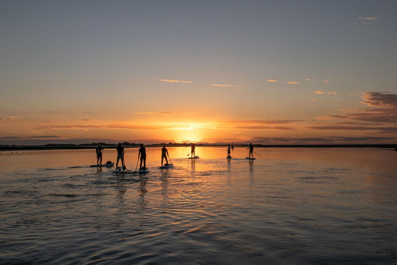Couché du soleil avec du paddle