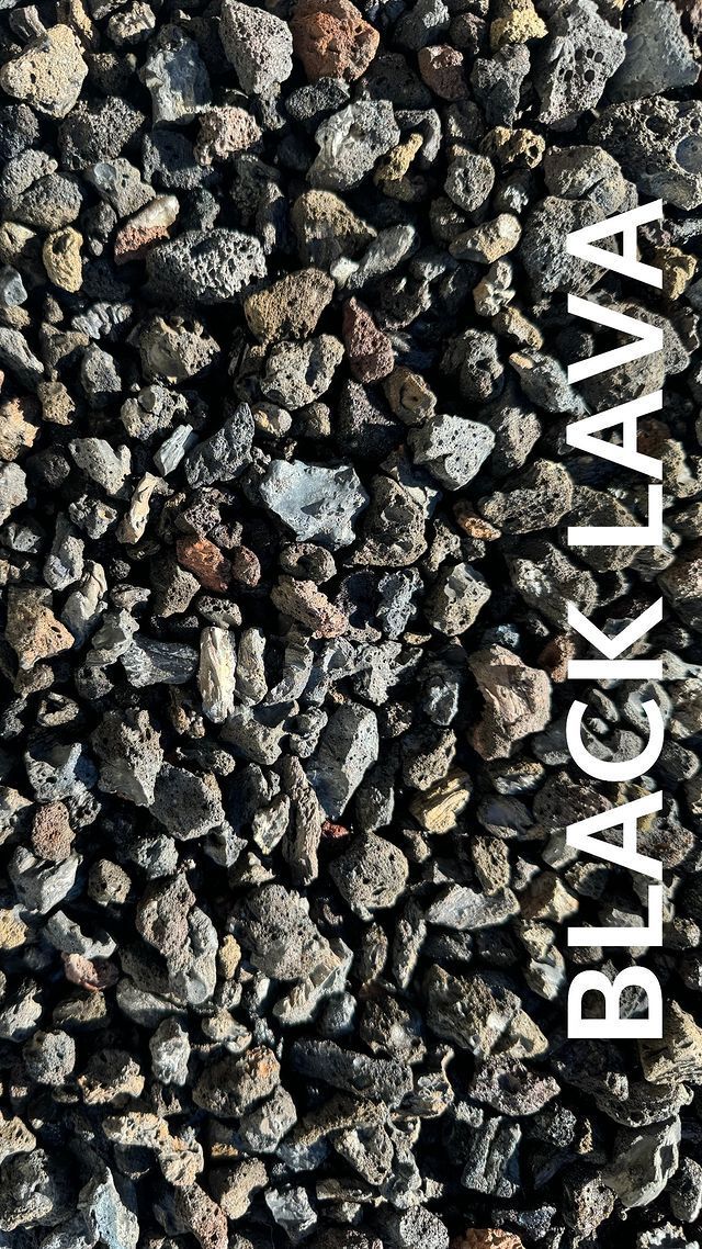 A pile of black lava rocks with the words `` black lava '' written on it.