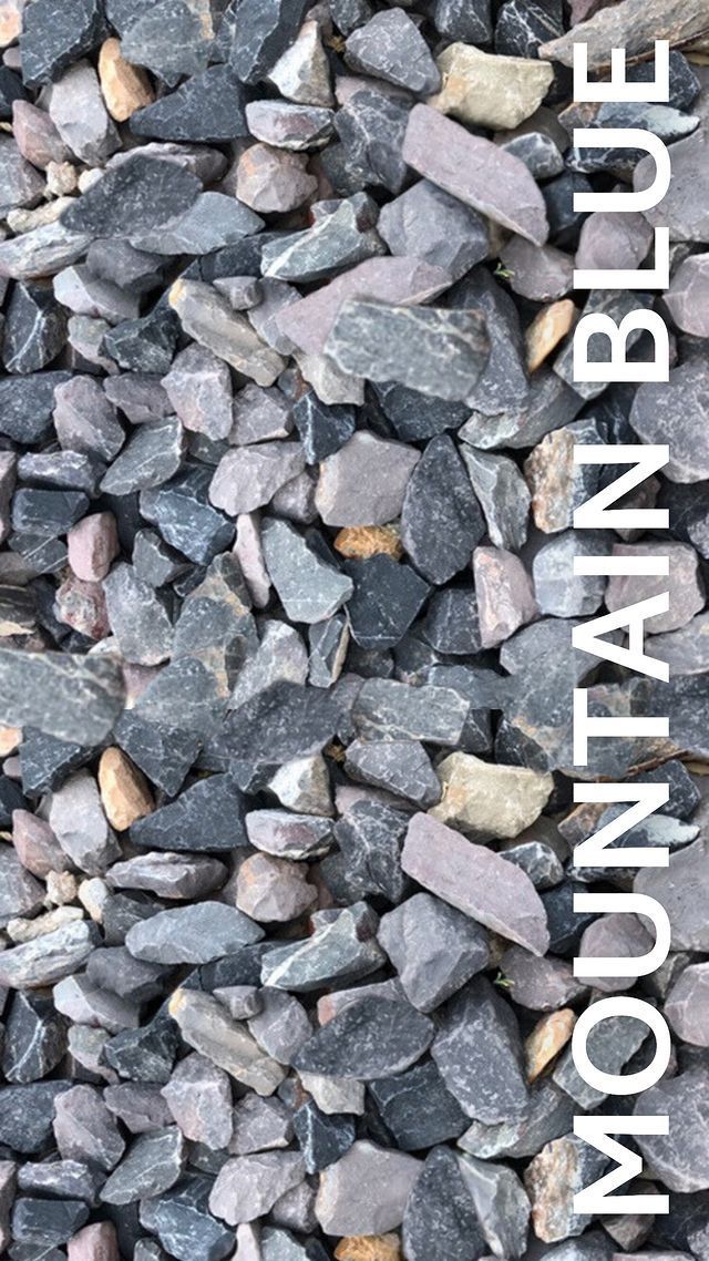 A pile of rocks with the words `` mountain blue '' written on them.